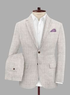 With our Solbiati Haze Beige Linen Suit isn't just about getting dressed; it's about adorning oneself with a masterpiece of fashion that embodies timeless class. Crafted meticulously from pure linen fabric, distinguished by its striking solid pattern, this suit's versatile beige hue accentuates its adaptability, making it suitable for a multitude of occasions. Whether you're commanding attention in the boardroom or exuding elegance at a wedding, this suit radiates refinement and ensures a distin Beige Linen Suit, Tweed Shirt, Peaky Blinders Suit, Suit Measurements, Herringbone Suit, Oxford Blue, Tweed Suits, Blazer Designs, Getting Dressed