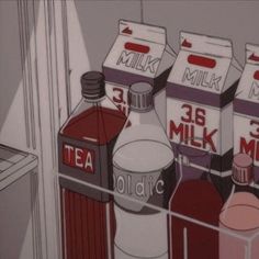 a refrigerator filled with lots of different types of milk