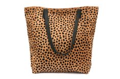 Discover the ultimate Fall must-have with our Leopard Tote Bag. Featuring ample storage space and crafted from premium genuine leather, this tote is the perfect combination of style and practicality. Upgrade your autumn wardrobe with this expertly designed accessory. (PRODUCT INFO): Material: Genuine calf hair leather Shoulder strap Item made by skilled leathersmiths Snap top closure Fully lined suede interior Non-adjustable leather strap Inner zipped pocket Size: 16" H x 17" W x 5" D inches (SH Luxury Leather Shoulder Bag In Leopard Print, Luxury Leather Leopard Print Shoulder Bag, Leopard Print Leather Shoulder Bag With Leather Handles, Leather Shoulder Bag With Leopard Print And Leather Handles, Luxury Leather Bags In Leopard Print, Luxury Leopard Print Leather Bag, Leopard Print Leather Tote Shoulder Bag, Brown Calf Hair Bag For Daily Use, Leopard Print Shoulder Bag With Leather Handles For Shopping