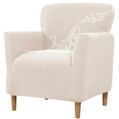 a white chair with wooden legs and an embroidered pillow on the armrest, against a white background