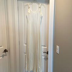 Like New Beautiful Ivory Size 4 Dress. Worn Once! White Fitted Silk Slip Dress, Off White Sleeveless Maxi Dress For Formal Events, Formal Off-white Sleeveless Maxi Dress, Formal Sleeveless Off-white Maxi Dress, Formal Sleeveless Off White Maxi Dress, Elegant Cream Slip Dress For Daywear, White Fitted Silk Maxi Dress, Fitted White Silk Maxi Dress, Elegant White Lined Maxi Dress