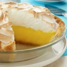 a lemon meringue pie on a white plate