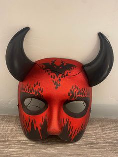 Red mask black horn nwt  Not worn Red Halloween Costume Mask, Red Fantasy Halloween Masks, Novelty Red Mask Costume Accessory, Red Novelty Mask Costume Accessory, Novelty Red Costume Mask, Devil Mask, Red Mask, Mask Black, Mask Halloween