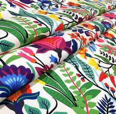 multicolored floral print fabric on white background