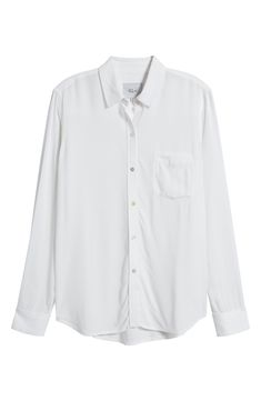 Expand your wardrobe options significantly with this flowy and versatile white button-up shirt. 27" length (size Medium) Front button closure Spread collar Long sleeves with button cuffs Chest patch pocket 100% rayon Hand wash, line dry Imported White Button Up Shirt Women, Plain Button Up Shirt, White Long Sleeve Button Up, Button Up Long Sleeve, Oversized White Button Down, White Button Up Shirt, White Dress Shirt, Collar Shirt, Button Ups