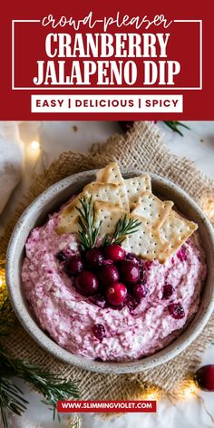 cranberry jalapeno dip in a bowl with crackers