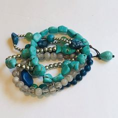 Combine Your Purchases For Shipping Discount. First Item Regular Price, All Additional Items Only 1.50 Each. Bracelet Quartz Turquoise Blue Beaded Marbled Fish Sand Dollar Stretch Set Of 5 Like New Never Worn Faux Turquoise- It Is A Marbled Quartz Blue Gemstone Beads Wrap Bracelet, Blue Gemstone Beads Wrap Bracelet With Round Beads, Casual Turquoise Jewelry With Gemstone Beads, Casual Turquoise Bracelets With Large Beads, Blue Multi-strand Hand-strung Bracelet, Casual Turquoise Beaded Bracelets Hand Wrapped, Blue Hand-strung Multi-strand Bracelet, Casual Turquoise Hand Wrapped Beaded Bracelets, Casual Blue Jewelry With Large Beads