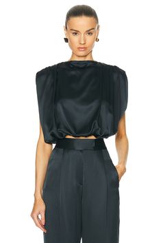 Find THE SEI Gathered Shoulder Top In Black on Editorialist. The Sei Gathered Shoulder Top in Black 100% silk. Made in USA. Dry clean only. Item not sold as a set. TSEX-WS65. Ts2011. About the designer: THE SEI is a luxury ready-to-wear collection based in L.A. and founded in 2020 by an all-female team of diverse individuals. With prior experience working together at Michelle Mason, the team set out on their own venture where THE SEI was born. The brand sets out to create thoughtful pieces, designed for women—by women, expanding beyond a range of generations and lifestyles. THE SEI aims to build a foundation of polished classics mixed with seductive silhouettes inspired to empower women to feel at their most confident and balanced self, while remaining effortless and timeless. Luxury Silk Tops For Night Out, Luxury Silk Top For Night Out, Luxury Silk Top For Evening, Luxury Silk Evening Top, Black Satin Tops For Evening, Foundation Brands, Michelle Mason, Pleat Top, Empower Women