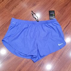 Nwt Nike Dri-Fit Running Shorts. They Have The Built In Underwear Support, Small Zip Pocket Along Back Waistband And Muted Design On The Fabric. Color Is Periwinkle/Cornflower (Between Blue And Purple) Stretch Nike Shorts In Purple, Nike Stretch Purple Shorts, Stretch Purple Nike Athletic Shorts, Nike Stretch Athletic Shorts In Purple, Nike Purple Athletic Stretch Shorts, Nike Purple Shorts, Nike Purple Bottoms With Built-in Shorts, Outfit Outer, Cute Nike Outfits