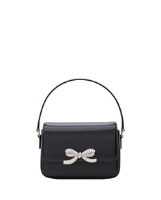 This Self-Portrait micro bag showcases a striking diamond bow on the front, secured with a magnetic flap closure. A removable shoulder chain enhances its versatility for different occasions.

- Magnetic flap closure  
- Removable shoulder chain  
- Diamond bow detail Micro Bags, Micro Bag, Chain Diamond, Diamond Bows, Designer Products, Shoulder Chain, Black Bag, Bow Detail, Self Portrait