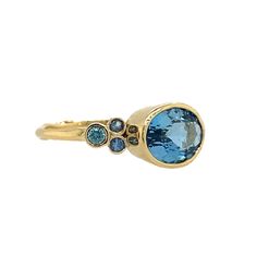 YES to this blue on blue beauty! A perfect blue Aquamarine is set in 14k yellow gold and accented with Sapphires and Blue Zircon. Finished on Emily's signature seagrass band. We originally saw this as being a unique engagement ring or that perfect something blue on the big day but it would be just as wonderful as an everyday bit of sparkle. Approximate stone size: 10mm x 7mm Approx Stone CT weight: 2 ct Mohs Stone Hardness: 7.5-8 This one of a kind piece is handmade with love in Emily's Hudson V Blue Zircon Ring, Blue Beauty, Perfect Blue, Unique Engagement Ring, Local Jewelry, Aqua Marine, Zircon Ring, Aquamarine Rings, Blue Zircon