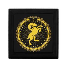 a yellow zodiac sign on black background keepspace with gold foil and an ornate design