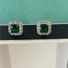 New! Sold Out! Stunning Emerald Earrings. 14k White Gold Finish. Quality Jewellery. Emerald Cut Stone. Made In Italy, Luxury Backing Stud Earrings. Retail Price: $950.00 Bergdorf Goodman Retail: $950.00 Dress Like A Royal Duchess! Luxury Green Sterling Silver Diamond Earrings, Green Sterling Silver Luxury Diamond Earrings, Luxury Green Diamond Earrings In Sterling Silver, Classic Emerald Earrings For Formal Occasions, Formal Emerald Jewelry With Halo Design, Classic Formal Emerald Earrings, Formal Emerald Halo Jewelry, Elegant Diamond-accented Earrings For May Birthstone, Elegant Earrings With Diamond Accents For May Birthstone