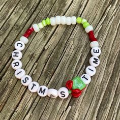 Spice up a Christmas celebration with this beaded bracelet. It can be customized with different letter beads and charms. You do you boo! Necklace can be made with elastic string or flexible wire with lobster or toggle clasps. ❗️Be sure to know your wrist size before placing an order❗️ Let me know if you have any questions! 💕 Themed White Beaded Bracelets Gift, Themed White Beaded Bracelets For Gift, Adjustable White Themed Stretch Bracelet, Personalized Adjustable Beaded Bracelets For Christmas, Adjustable White Stretch Bracelet For Holidays, White Beaded Bracelets With Letter Beads For Christmas, Novelty White Stretch Bracelet As Gift, You Do You Boo, Swift Bracelets