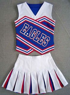 a cheerleader uniform with the word eagles on it is shown in red, white and blue