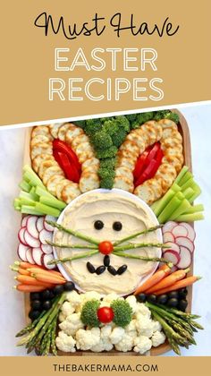 a platter filled with vegetables, veggies and a face made to look like a cat