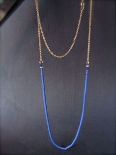 If you want to pay with PayPal, please contact me. Necklace details: * The necklace made from 14 karats solid yellow gold, and Blue Lapis stones. * Gold chain length: 15.7inch/ 40cm'. * Lapis chain length: 7.9inch/ 20cm. * the total length of the necklace: 23.6inch/ 60cm. Beautiful gold and Lapis chain necklace. sophisticated in its simplicity. The necklace can also be used as a bracelet. IF YOU WANT A CUSTOM necklace please contact me before purchase. When I write Handmade I really mean it. eac Blue Lariat Jewelry With Adjustable Chain, Elegant Blue Jewelry With Beaded Chain, Elegant Blue Beaded Chain Jewelry, Blue Long Necklace With Adjustable Chain, Elegant Blue Chain Necklace, Dainty Blue Chain Jewelry, Elegant Blue Chain Jewelry, Minimalist Blue Beaded Chain Jewelry, Elegant Blue Jewelry Chain