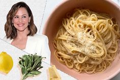 a bowl of pasta with lemons and herbs next to a woman's face