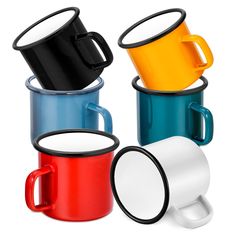 three different colored coffee mugs sitting next to each other