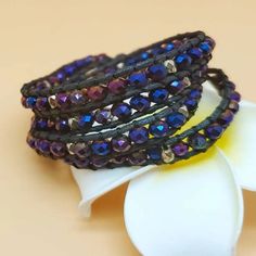 New Beaded Wrap Bracelet Long Single Strand ~ Black Cord ~ Trendy Boho Vibe Intertwined Purple & Blue Oil Slick Holographic Colored Beading Bronze Tone Beaded Accents & Button Style Closure Fantastic Versatile Layered Accessory - Great Jewelry Addition Wear Many Ways Including: As A Necklace / As An Arm Bracelet / Waist-Belly Chain Body Jewelry / Layered Anklet Approx Measurements: 30 In Total 28 Inches Long Beaded Area Closure Points At Last Two Inches Purchasing For Someone? Gift Wrapping Avai Purple Round Beaded Bracelets For Festivals, Purple Beaded Bohemian Wrap Bracelet, Handmade Bohemian Purple Wrap Bracelet, Purple Handmade Bohemian Wrap Bracelet, Purple Colorful Beads Bracelets For Festival, Purple Faceted Beads Bracelets For Festivals, Purple Faceted Beads Bracelet For Festivals, Purple Faceted Beaded Bracelets For Festivals, Purple Bracelets With Colorful Beads For Festival