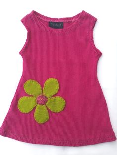 Pink cotton tunic for baby embroidered by hand entirely designed from recycled knitwear!  This cute and comfortable dress goes perfectly with leggings, over a sweater, a blouse or a long-sleeved T-shirt.  - Extra soft dark pink cotton - Green flower-shaped woolen appliques  - 3 colors of embroidery threads: pale green, dark green and pink - Stretchy, pulls on very well  Size: 6 months to 2 years depending on your child measurements.  Height: 16 inches (40 cm)  Neck circumference: 17 1/2 inches ( Cute Fitted Knit Dress, Playful Knitted Cotton Tops, Knitted Cotton Dresses For Spring, Spring Cotton Knitted Dresses, Hand-knitted Cotton Dresses In Cute Style, Hand Knitted Cotton Dresses In Cute Style, Cute Hand Knitted Cotton Dresses, Handmade Pink Tops For Spring, Hand Knitted Cute Cotton Dresses