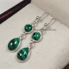 Natural Malachite Earring, 925 Sterling Silver Earring, Handmade Gemstone Earring, Dangle Dainty Earring, Valentine Day Gifts : D E T A I L S : Handcrafted with lots of love ♥ and care Gemstone- Natural Malachite Finish: Silver Closure: Ear Wire Measurement: Earring Length: 35 MM, Width: 8 MM Our Jewelry is Silver polished on 925 sterling silver metal. This piece of jewelry is perfect as a gift for yourself, for a friend, a gift for Valentine's day, or a birthday. Magical Treasure Cave: Please c Sterling Silver Teardrop Earrings Set, Sterling Silver Teardrop Matching Earrings, Sterling Silver Teardrop Jewelry With Matching Earrings, Green Teardrop Sterling Silver Jewelry, Green Sterling Silver Teardrop Earrings Gift, Silver Gemstone Dangle Teardrop Earrings, Sterling Silver Long Drop Teardrop Gemstone Earrings, Green Sterling Silver Long Drop Earrings, Sterling Silver Drop Earrings For May Birthstone