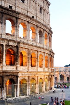 an old photo of the colossion in rome taken on a cell phone screen