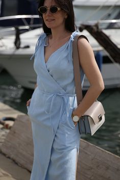 Classy and universal linen wrap dress DUBAI. Envelope yourself into this beauty (easy closure with a linen belt). Perfect for any occasion! Wear it for a picnic, a special occasion, the beach, vacation, a date or a wedding! DETAILS:     Made from 100% certified European linen (OEKO TEX certified)     Stone washed for maximum softness     Length bellow the knees     Sleeveless     Two side splits     Practical two side pockets in seams. SIZE:     S, M, L, XL , XXL.     Model is 5'6″ (172 cm) and Summer Wrap Dress For Day Out, Chic Linen Dress For Picnic, Spring Linen Dress With Tie Fastening, Summer Wrap Dress For Brunch, Summer Vacation Belted Wrap Dress, Chic Summer Wrap Dress With Tie Fastening, Chic Wrap Dress With Tie Fastening For Summer, Chic Summer Belted Linen Dress, Casual Summer Linen Wrap Dress