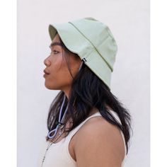 Introducing our versatile and nifty bucket hat, designed to keep you cool and protected. Made with a breathable fabric, this hat is the perfect companion for warm weather adventures. Its traditional brim gives sun protection, shielding you from harmful UV rays while adding a touch of style to your outdoor looks. The pull cord keeps your hat secure while adventuring, park lounging, or outdoor brunching. Available in 3 summer perfect colors for all ages and genders. Your ultimate companion for out Adjustable Cotton Bucket Hat With Uv Protection, Adjustable Fit Cotton Brimmed Bucket Hat, Adjustable Cotton Bucket Hat With Wide Brim, Adjustable Fit Cotton Bucket Hat With Wide Brim, Adjustable Cotton Wide Brim Bucket Hat, Adjustable Summer Cotton Bucket Hat, Summer Cotton Bucket Hat With Adjustable Fit, Adjustable Sun Hat With Uv Protection For Everyday, Adjustable Uv Protection Sun Hat