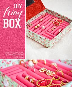 an open pink box filled with lots of jewelry