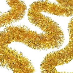 golden tinsel christmas tree branches on white background with clipping path to the right