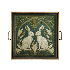 a painting with two white rabbits on it's sides and an ornate border around the edges