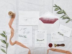 the wedding stationery is laid out and ready to be used