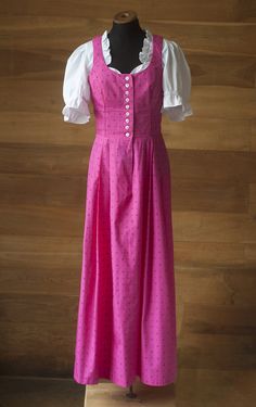 Pink sundress of the Austrian brand Wenger. The sundress fastens with buttons in the front. The waist is high. Sundress made of natural fabric - 100% cotton. ♥ Shoulders 30 cm ♥ Pit to pit 44-45 cm ♥ Waist 35 cm (high waist) ♥ The length of the product is 135 cm Material: 100% cotton Vintage Pink Prairie Dress For Summer, Pink Short Sleeve Maxi Dress With Buttons, Pink Buttoned Maxi Dress For Summer, Pink Maxi Dress With Buttons, Pink Sundress, Maxi Sundress, Natural Fabric, Pink Vintage, Vintage Rose