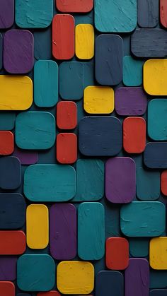 a colorful wall made up of different colored blocks