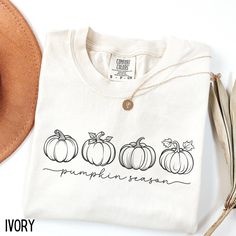 Pumpkin Season T-Shirt, Cute Fall Shirt, Minimal Autumn Tee, Pumpkin Halloween TShirt, Minimal Pumpkin Gift, Comfort Colors® Shirt for Fall Welcome to Ava Leigh Tees!! If you are looking for soft, well designed, and comfy t -shirts, you have come to the right place! We strive to provide beautiful shirts for all occasions as well as a great customer experience. If you have any questions about our shirts, please feel free to shoot us a message anytime. We try our best to message everyone back with Basic White T-shirt For Fall, Fall Tshirt Ideas, Fall Shirts Vinyl, Cute Fall Shirt, Pumpkin Gift, Halloween Tshirt, Autumn T Shirts, Pumpkin Season