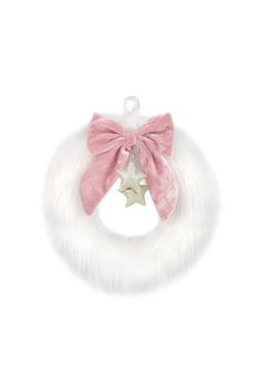 a pink and white wreath with a star on it, hanging from the front end