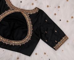 Here Are The Latest Designs For Bridal Blouses With Maggam Work. The Maggam Work With Kundan, Thread And Spring Can Be Customised Along With The Cloth Color You Want To Choose. Having These Kind Of Maggam Work Blouses Is Very Trendy For Traditional Gatherings And Poojas.  This Enhances The Beauty Of Any Saree When This Is Teamed Up With Different Kind Of Maggam Designs. The Combination Of Aari And Zardosi Works Make This Maggam Designs Look Very Elegant And Beautiful. We Customize The Blouse As Black Saree Blouse Designs, Black Saree Blouse, Black Blouse Designs, Pavadai Sattai, Silk Saree Blouse Designs Patterns, Blouse Works, Blouse Ideas