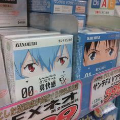 an assortment of anime dvds on display in a store