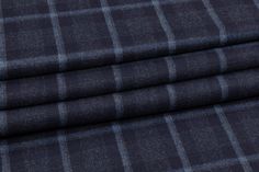 This fabric has a medium weight and soft touch perfect for winter suiting. Winter Cotton Business Suits, Navy Suits For Winter, Winter Business Suits In Cotton, Winter Business Cotton Suits, Elegant Cotton Suits For Winter, Navy Wool Winter Suits, Navy Wool Suits For Winter, Navy Winter Business Casual Suits, Blue Wool Suits For Fall