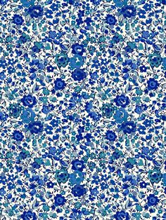 a blue and white floral pattern on fabric