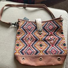 Nwt Western Hobo Shoulder Bag. Brand Is Myra. Has Fur Accent, Canvas Back With Zipper, And Woven Front. Leather Accent. Strap Clips/Unclips And Adjusts Multicolor Bags With Adjustable Strap For Errands, Daily Use Shoulder Satchel With Snap Closure, Multicolor Shoulder Bag With Removable Pouch For Errands, Daily Use Satchel With Snap Closure, Everyday Shoulder Bag With Snap Closure And Double Handle, Everyday Double Handle Bags With Snap Closure, Everyday Shoulder Bag With Snap Closure, Double Handle Shoulder Bag With Snap Closure, Bohemian Canvas Satchel Bag