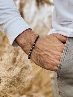 Men's bracelet with black beads and silver beads made from metal, passed through an elastic cord. In Christina Christi Jewels store you can see more than 50 designs in Men's Bracelets. You can have them in 2-4 Days with DHL EXPRESS SHIPPING - Black Beads - Metal Beads. - Metal Parts. - Elastic cord. - You can choose four different dimensions for your hand. * 17 cm - 6.6'' * 19 cm - 7.4'' * 21 cm - 8.2'' * 23 cm - 9.0'' In this link you can see my creations with section, Men's Bracelets: https:// Mens Black Bracelet, Men Bracelet Black, Minimalist Hand-strung Black Beaded Bracelets, Mens Black Bead Bracelet, Masculine Black Everyday Bracelets, Masculine Black Bracelets For Everyday, Masculine Black Adjustable Bracelets, Masculine Adjustable Black Bracelets, Mens Bracelet Designs