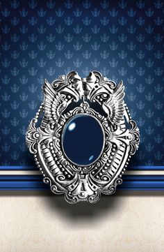 an ornate mirror on the wall with blue background