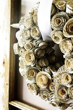 a screen shot of an instagram page with rolled up paper wreaths on it