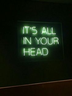 a neon sign that says it's all in your head