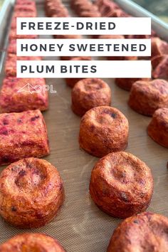 fresh fried honey sweetened plum bites on a baking sheet with text overlay that reads freeze - dried honey sweetened plum bites