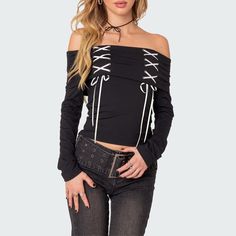 Elevate your style effortlessly with our Black Gothic Off-The-Shoulder Long Sleeve Top. The lace-up detail and folded neckline bring an edgy touch, while the bardot top style exudes sophistication. Crafted from a comfortable and stylish blend of polyester and spandex, this top is a must-have for your wardrobe. Lace-up detail Folded neckline Long sleeves Bardot top style Comfortable blend of polyester & spandex Bardot Top, Style Comfortable, Off The Shoulder Long Sleeve, Long Sleeve Top, Polyester Spandex, Off The Shoulder, Top Styles, Long Sleeve Tops, Sleeve Top