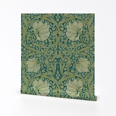 an intricately designed wallpaper with flowers and leaves in green, on a white background