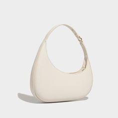 Go out in style with the Evelyn Moon Shoulder Bag, an exquisite underarm bag with a unique sailboat-inspired silhouette. Its sleek and irregular-shaped design exudes high-end fashion, making it a standout piece for any wardrobe. Its versatile structure fits all your essentials while effortlessly elevating your look. Treat yourself to this elegant and functional masterpiece! Now available in brown, black, khaki, and ivory. Chic Evening Baguette Bag With Single Handle, Modern Evening Shoulder Bag With Single Handle, Modern Single Handle Shoulder Bag For Evening, Chic Structured Beige Shoulder Bag, Modern Single-handle Shoulder Bag For Evening, Elegant Everyday Summer Baguette Bag, Elegant Summer Shoulder Bag For Office, Elegant Summer Office Shoulder Bag, Elegant Summer Shoulder Bag With Zipper Closure